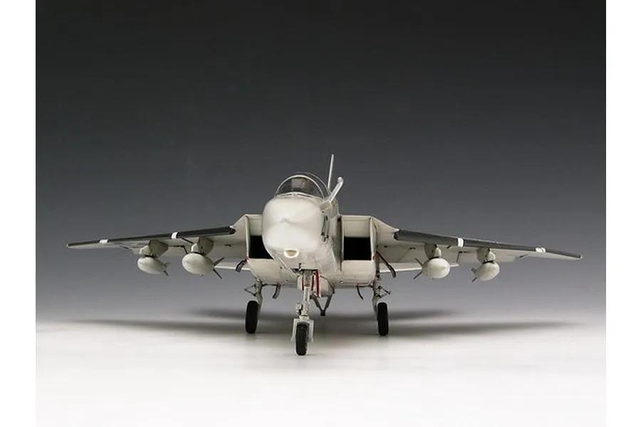 Front view of a finished 1/48 scale RA-5C Vigilante plastic model aircraft, showing landing gear and underwing stores against a gradient background.