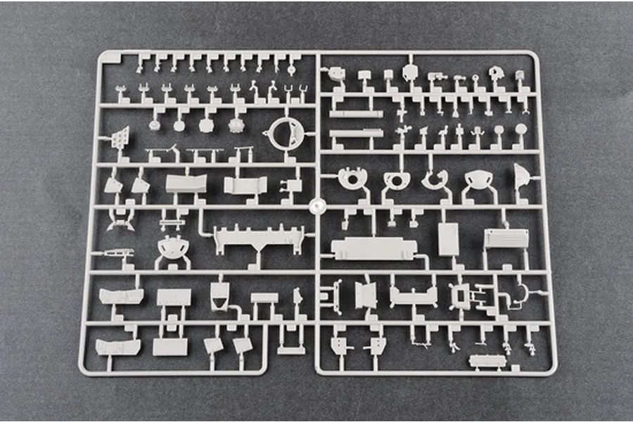 A grey plastic sprue containing various small model tank parts for a 1/35 scale Trumpeter T-72b kit.