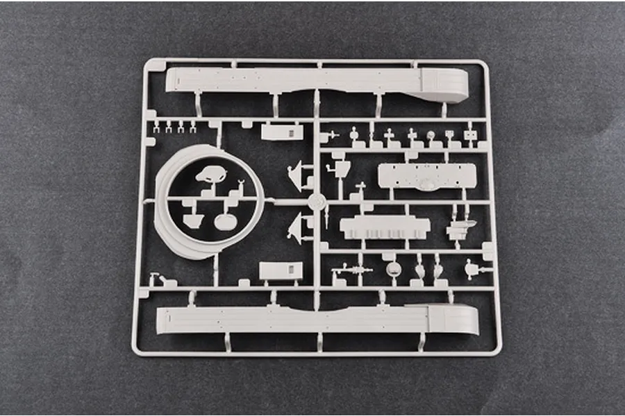 A grey plastic sprue from a Trumpeter 1/35 scale model kit featuring various tank parts on a dark grey background.