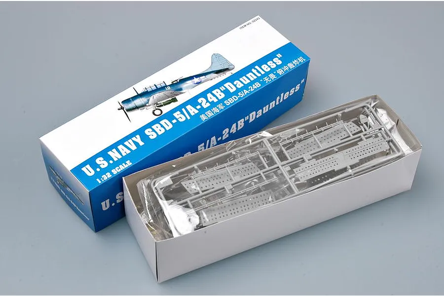 Trumpeter 1/32 scale SBD-5/A-24B Dauntless model kit box and open tray with plastic sprues inside.