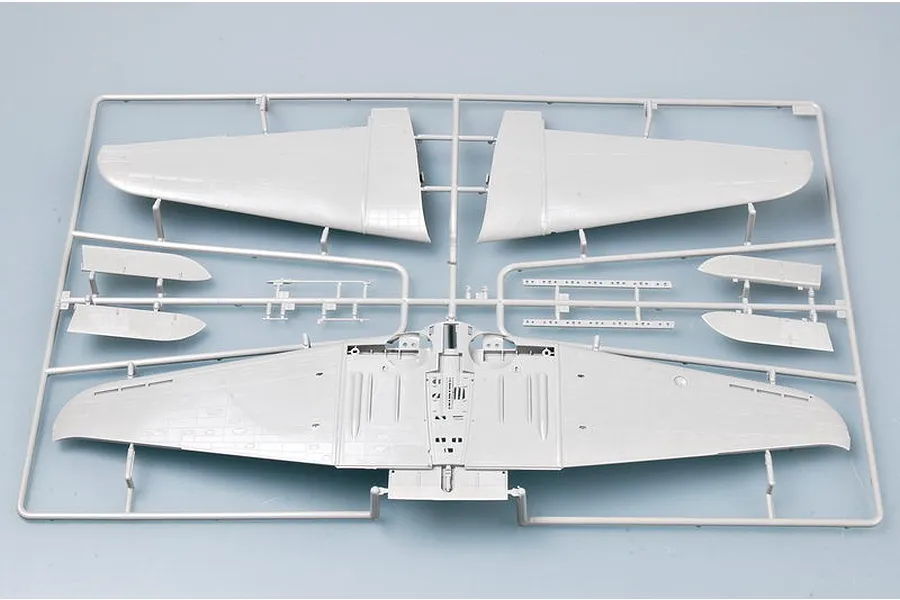 A grey plastic model kit sprue containing aircraft wing components for a Trumpeter 1/32 scale SBD-5 Dauntless model.