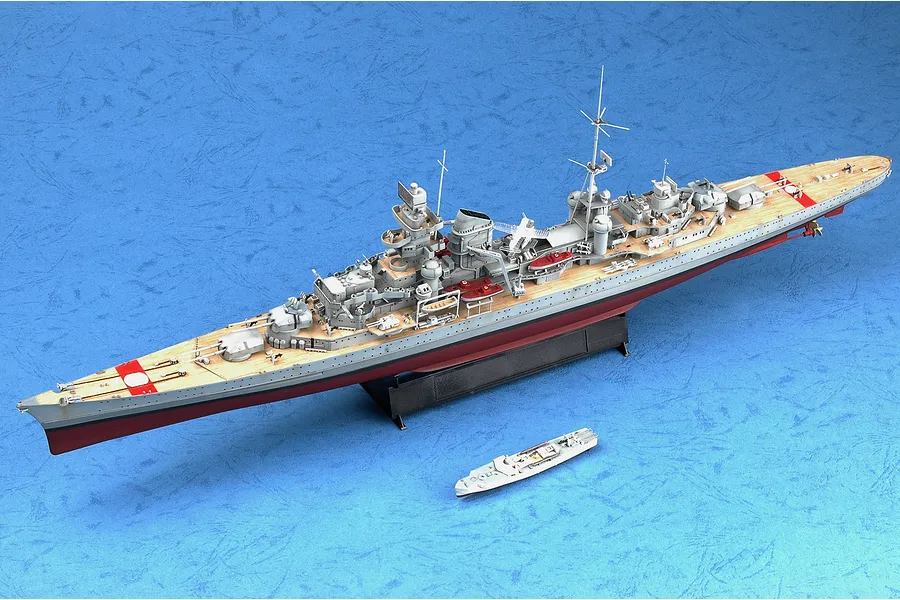 A 1/350 scale plastic model of the German heavy cruiser Prinz Eugen, displayed on a black stand against a textured blue background.