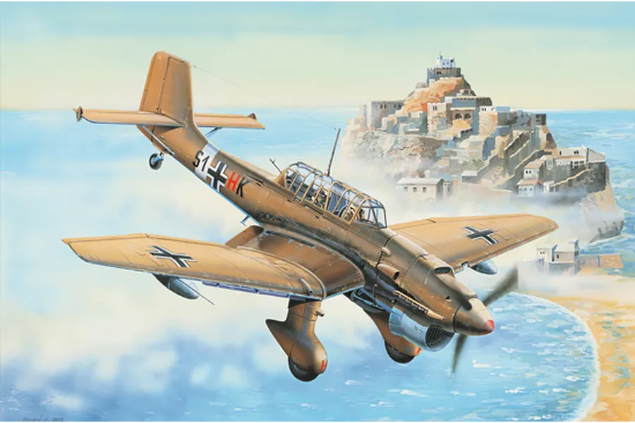Box art illustration of a Junkers Ju-87 Stuka dive bomber flying over a coastal fortress.