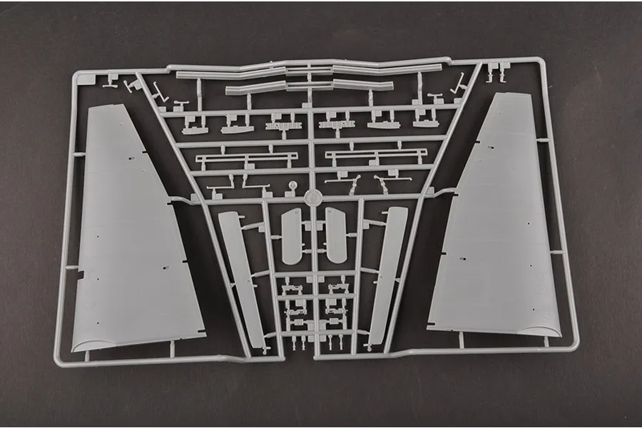 A grey plastic sprue containing aircraft wing and control surface parts for a 1/32 scale model kit.