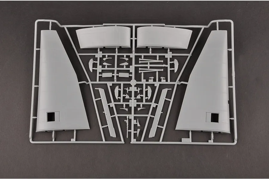 A grey plastic model aircraft sprue containing wing sections and smaller components for a 1/32 scale Junkers Ju-87R Stuka model kit.