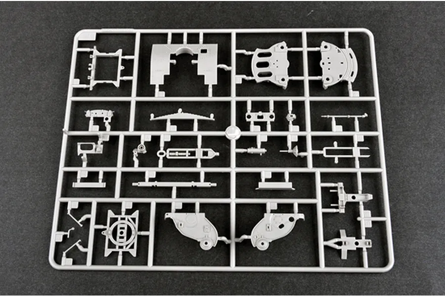 A grey plastic sprue containing various unpainted model kit parts for the Trumpeter 1/35 Russian AT-S Artillery Tractor.