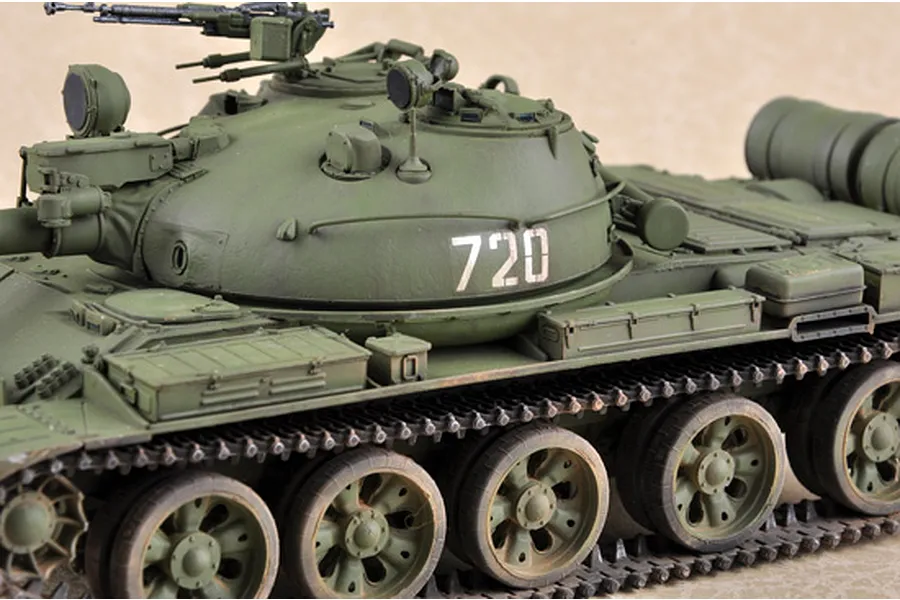 A detailed 1/35 scale model of a Russian T-62 tank, painted in olive green with the number 720 on the turret.