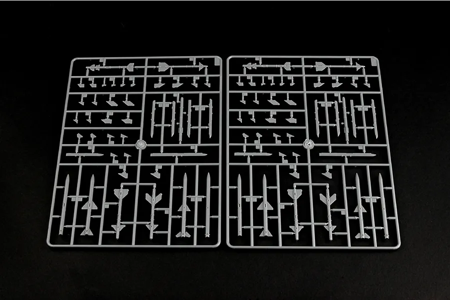 Two identical grey plastic model kit sprues containing various missile and weapon parts for a 1/48 scale aircraft model.