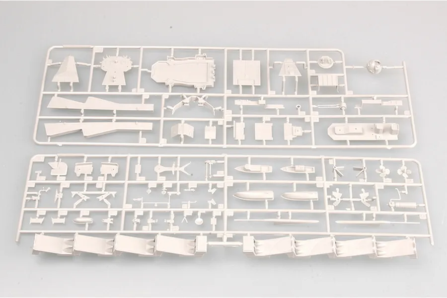 Two grey plastic model kit sprues containing various ship parts for a 1/350 scale model cruiser.