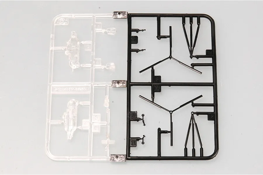 A plastic model kit sprue containing clear and black parts for a 1/350 scale Russian Navy Moskva cruiser model.