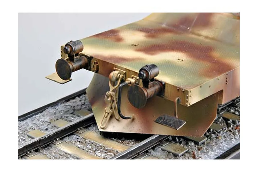 Close-up of the front end of a 1/35 scale German Panzerjager armoured train model kit on railway tracks.