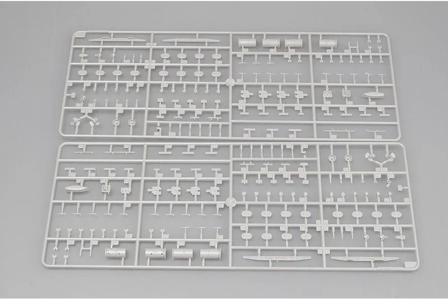 Two grey plastic model kit sprues containing various small ship parts for a 1/350 scale model.