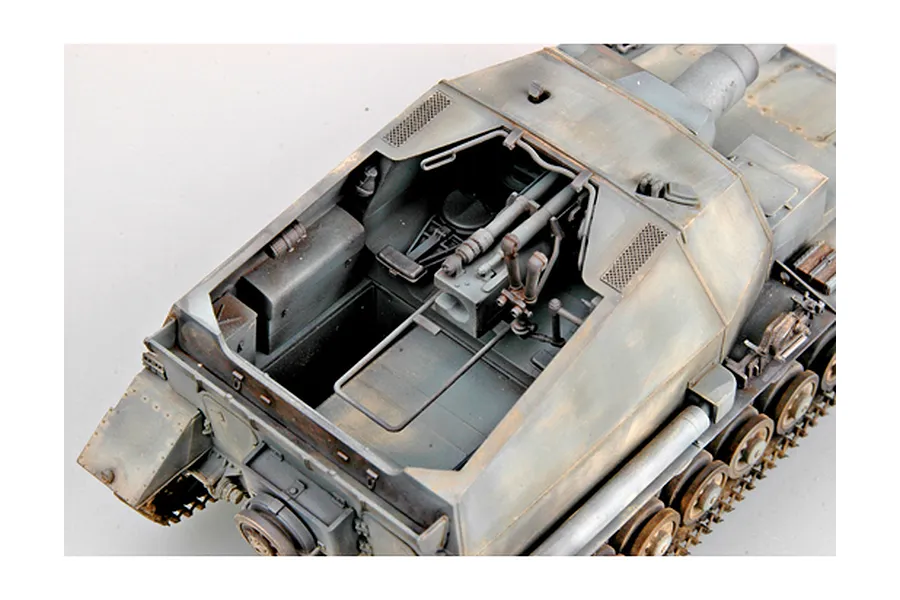 A high-angle view of a 1/35 scale model of a German Dicker Max self-propelled gun, showing the open fighting compartment and main cannon.
