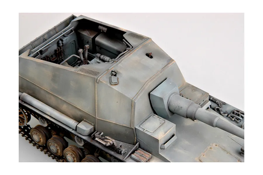 A high-angle view of a 1/35 scale model of a German Dicker Max self-propelled gun, showing the open fighting compartment and main cannon.