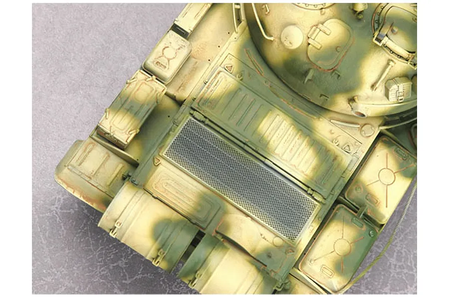 Top-down view of a painted 1/35 scale model T-62 tank showing the engine deck, turret, and storage boxes with camouflage paint.