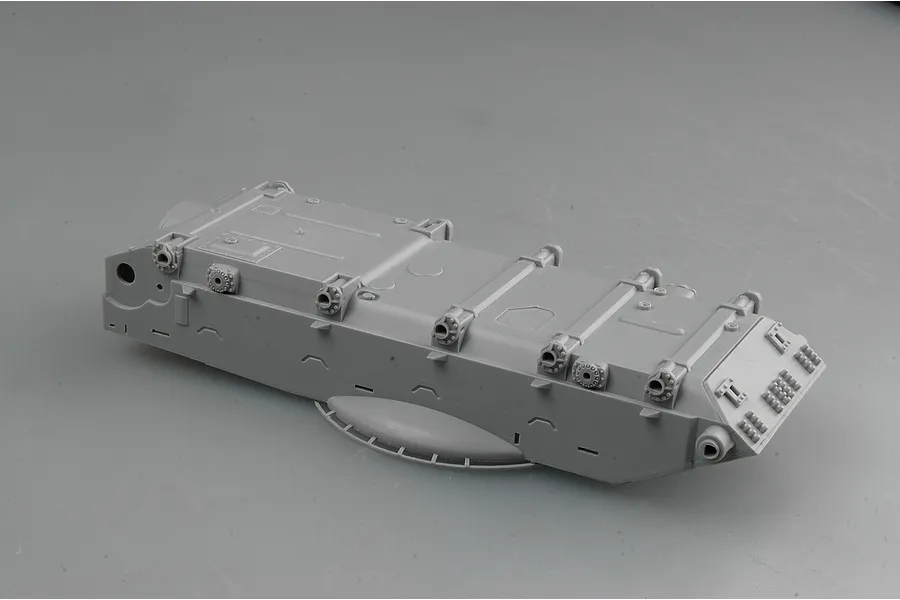 A grey plastic unassembled tank hull part for a 1/35 scale model kit on a neutral grey background.
