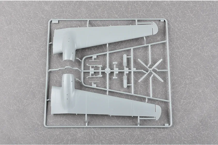 A grey plastic model aircraft wing sprue from a Trumpeter 1/72 scale model kit.