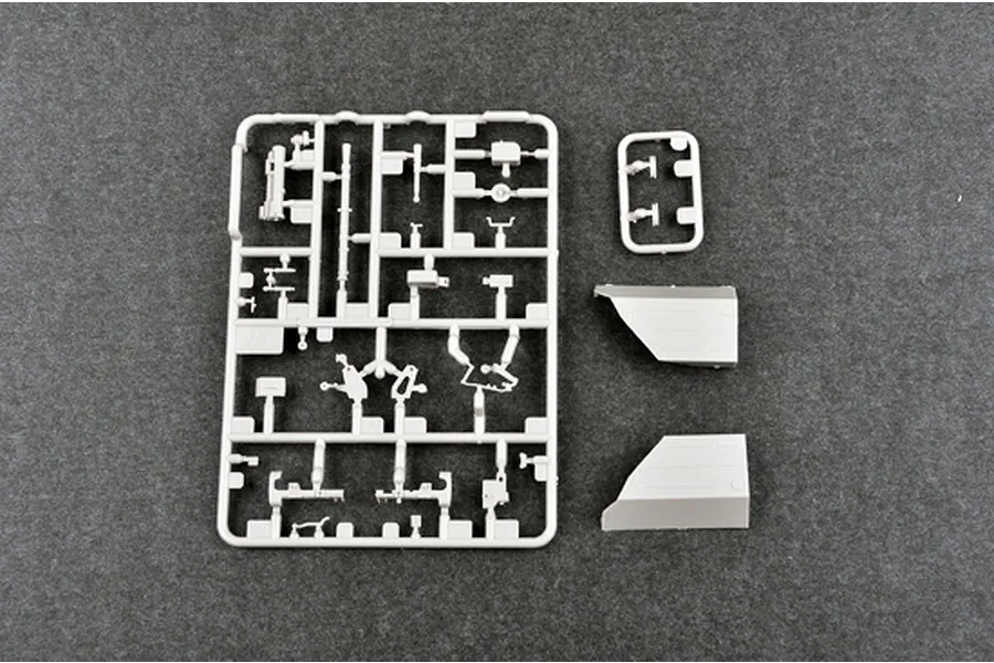 A grey plastic model kit sprue and two separate panel pieces for the Trumpeter 1/35 Soviet Object 268 tank destroyer model.