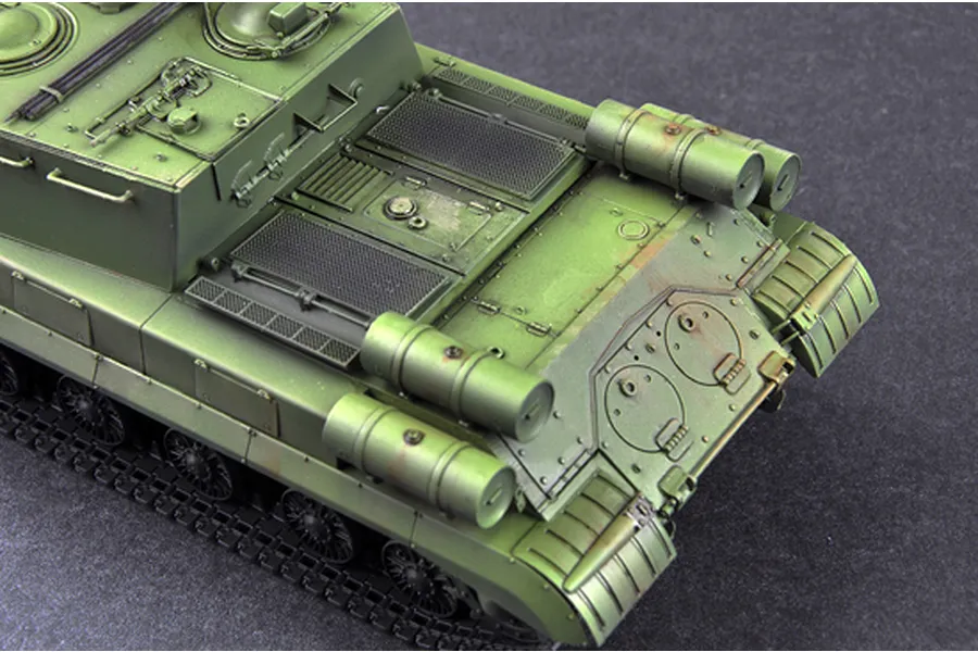 A high-angle view of the rear deck of a painted 1/35 scale Soviet JSU-152K self-propelled gun model kit, showing green camouflage and weathering.
