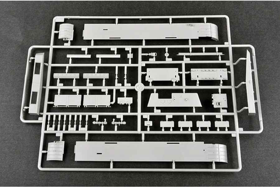 A grey plastic sprue containing various model tank parts for a 1/35 scale JSU-152K kit, laid out on a dark surface.