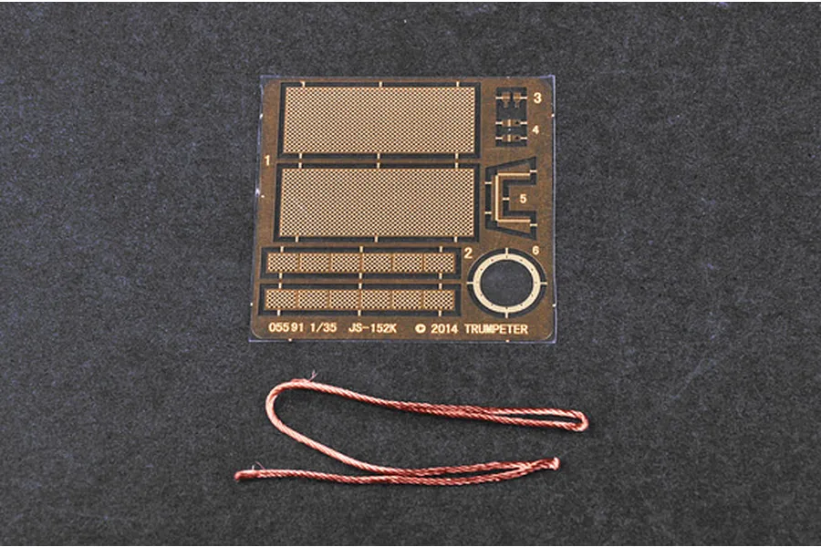 A photo-etched metal detail sheet and a length of copper wire for a 1/35 scale Trumpeter JSU-152K model kit.