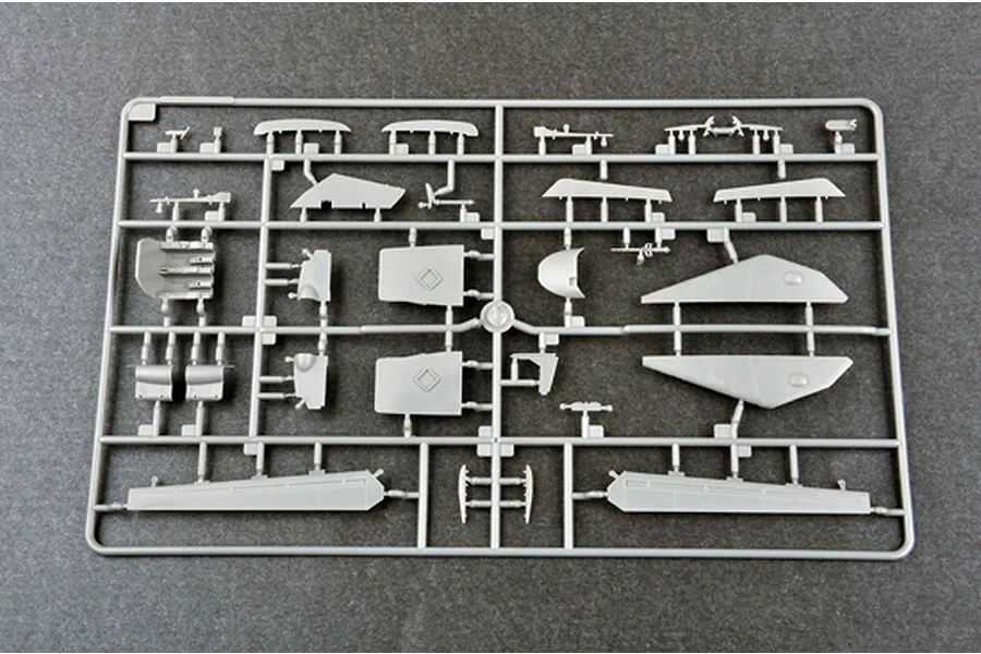 A grey plastic sprue containing various model aircraft parts for a 1/72 scale Su-24M Fencer-D model kit.