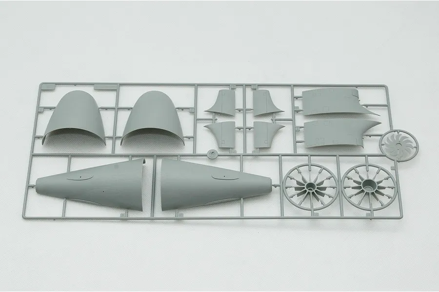 A grey plastic sprue from a Trumpeter 1/144 scale USS Seawolf model kit, showing submarine hull sections, fins, and propeller parts.