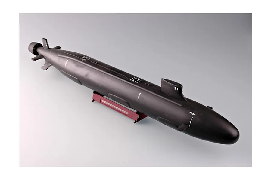 A completed 1/144 scale model of the USS Seawolf SSN-21 attack submarine, finished in matte black and mounted on a red display stand.