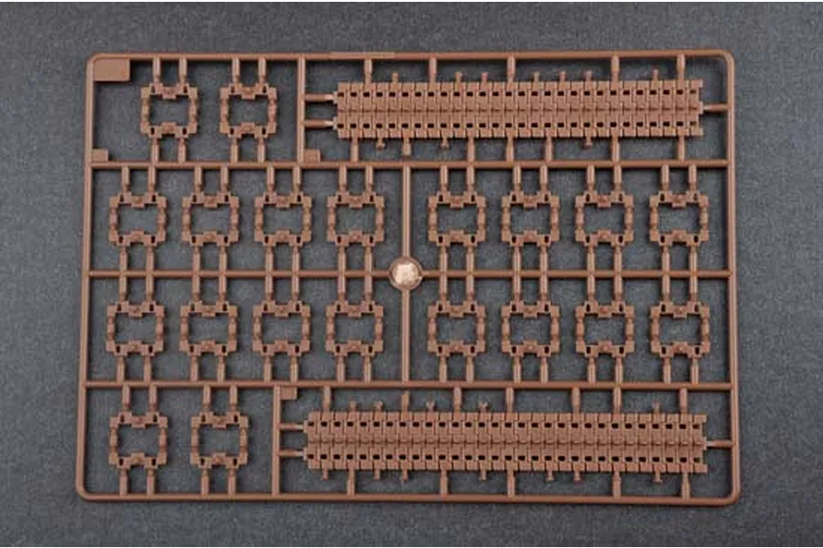 A brown plastic sprue containing individual tank track links and two long track sections for a 1/35 scale model kit.