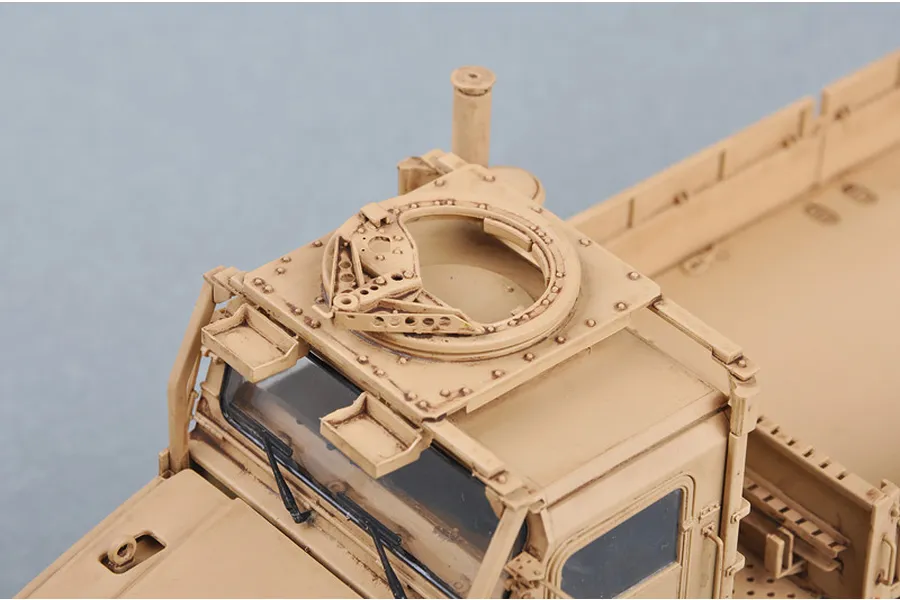 Close-up of the roof-mounted gun turret ring on a tan-coloured 1/35 scale Trumpeter MK.23 MTVR military truck model kit.