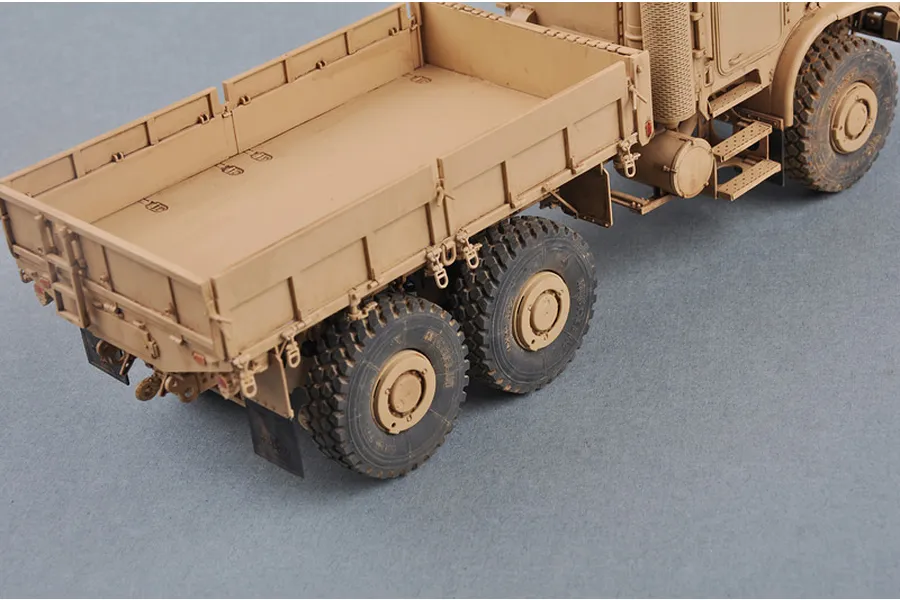 A high-angle view of a 1/35 scale model of a tan U.S. MK.23 MTVR military truck showing the cargo bed and rear wheels.