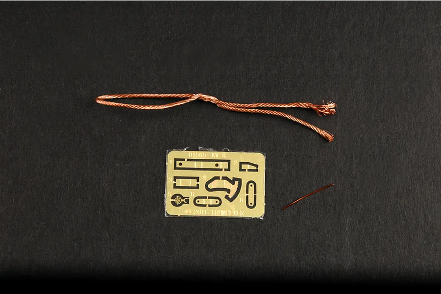 A photo-etched brass fret, a length of copper wire, and a single thin wire piece for the Trumpeter 1/35 Soviet KV-8 model kit.