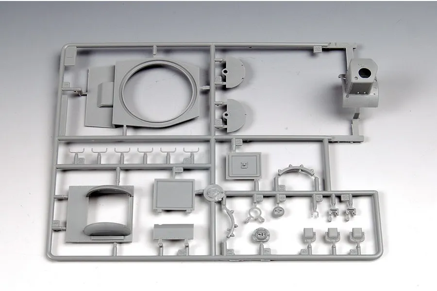 A grey plastic sprue containing various unpainted model tank parts for a 1/35 scale Russian KV.2 tank kit.