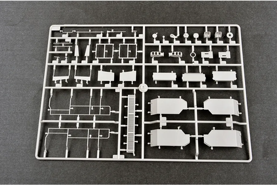 A grey plastic sprue containing various unpainted model parts for the Trumpeter 1/35 Russian A-222 Bereg coastal defense gun kit.