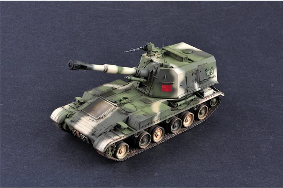 A 1/35 scale plastic model of a PLZ-83A self-propelled gun, painted in a green and tan camouflage pattern with the number 109 on the turret.