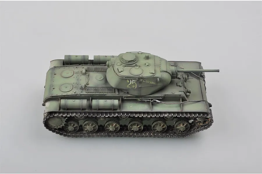 A high-angle studio shot of a fully assembled and painted 1/35 scale Soviet KV-1S heavy tank model, featuring olive green camouflage and the number 25.