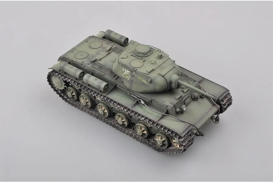 A high-angle studio shot of a fully assembled and painted 1/35 scale Soviet KV-1S heavy tank model on a plain grey background.