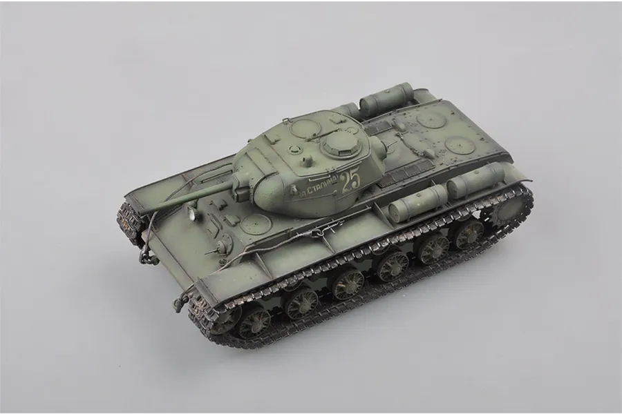 A high-angle studio shot of a fully assembled and painted 1/35 scale Soviet KV-1S heavy tank model on a plain grey background.
