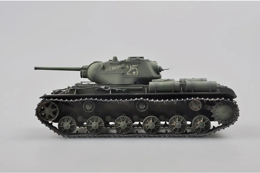 A side view of a 1/35 scale plastic model of a Soviet KV-1S heavy tank, painted in olive green with the number 25 and Cyrillic text on the turret.