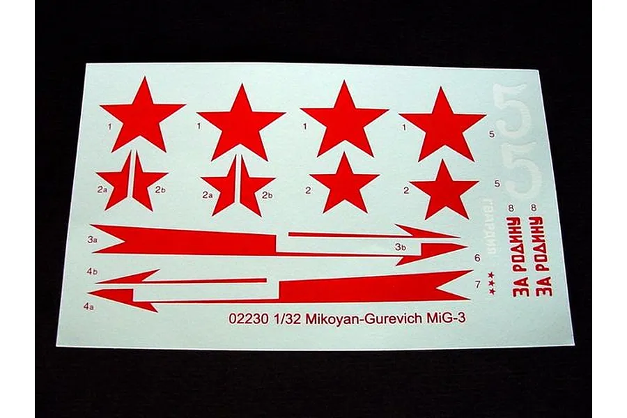 A decal sheet for a 1/32 scale Trumpeter MiG-3 model kit, featuring red Soviet stars, arrows, and Cyrillic text on a white backing.