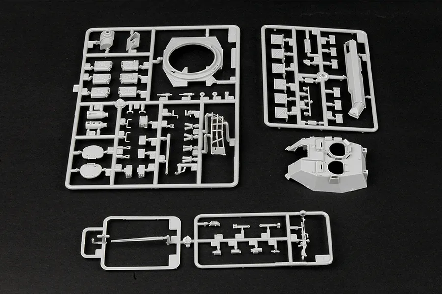 Plastic model kit sprues for the Trumpeter 1/35 LAV-25 SLEP armoured vehicle, showing various grey plastic parts on a black background.