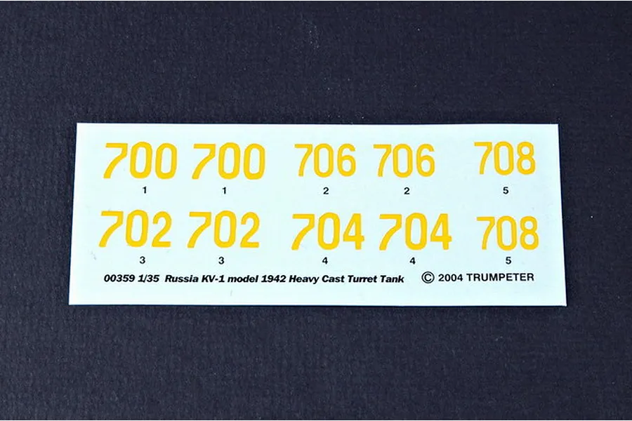 A decal sheet for a 1/35 scale Trumpeter Russian KV-1 tank model kit, featuring yellow identification numbers on a white backing.