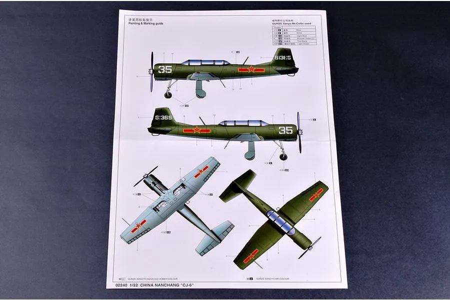 A painting and marking guide sheet for a Trumpeter 1/32 scale Nanchang CJ-6 model kit, showing side, top, and bottom views of the aircraft.