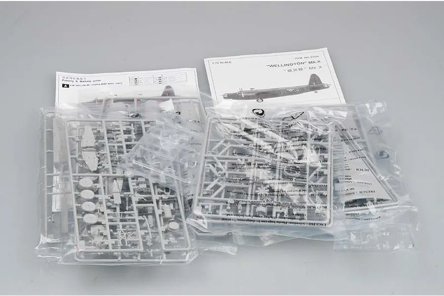 Trumpeter 1/72 scale Vickers Wellington Mk.X model kit components including plastic sprues and instruction manuals in clear plastic bags.