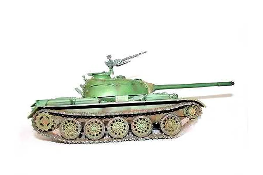 A side view of a 1/35 scale model of a Russian T-54A tank, painted in green with weathered tracks.