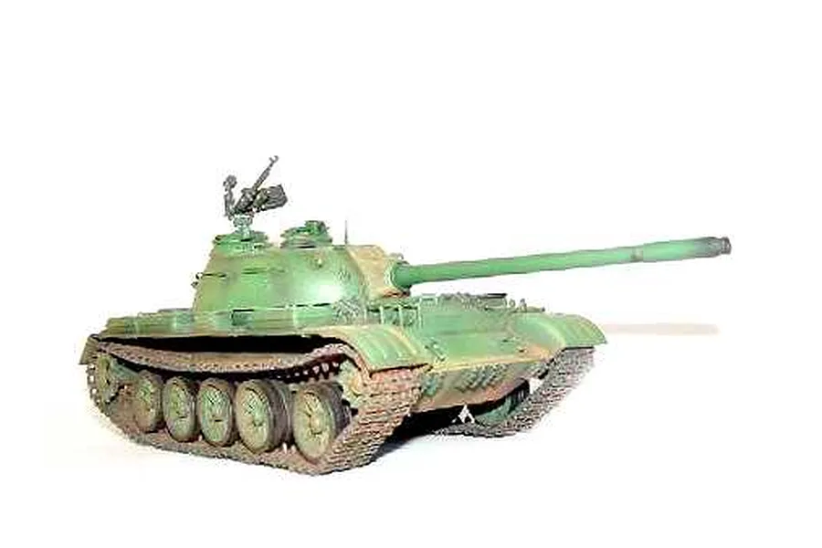 A completed and painted 1/35 scale model of a Russian T-54A tank, featuring a green camouflage finish and weathered tracks.