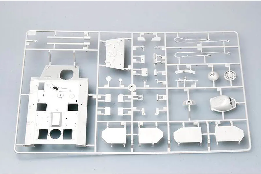 A grey plastic sprue containing various unpainted model tank parts for a 1/35 scale German E10 self-propelled gun kit.