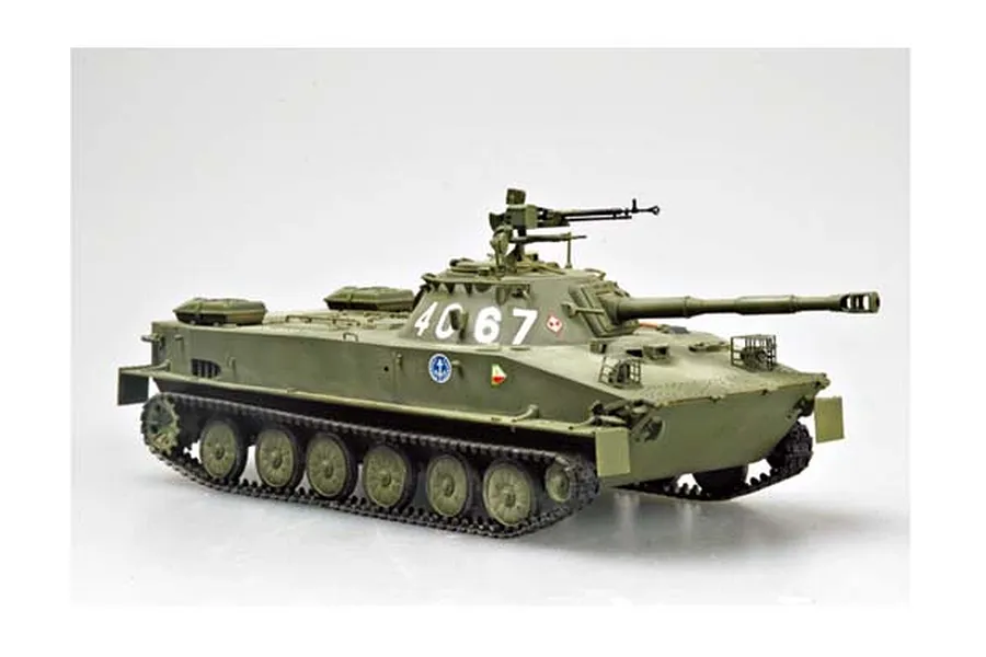 A 1/35 scale plastic model of a Polish PT-76B amphibious tank, painted in olive green with white markings and a machine gun mounted on the turret.
