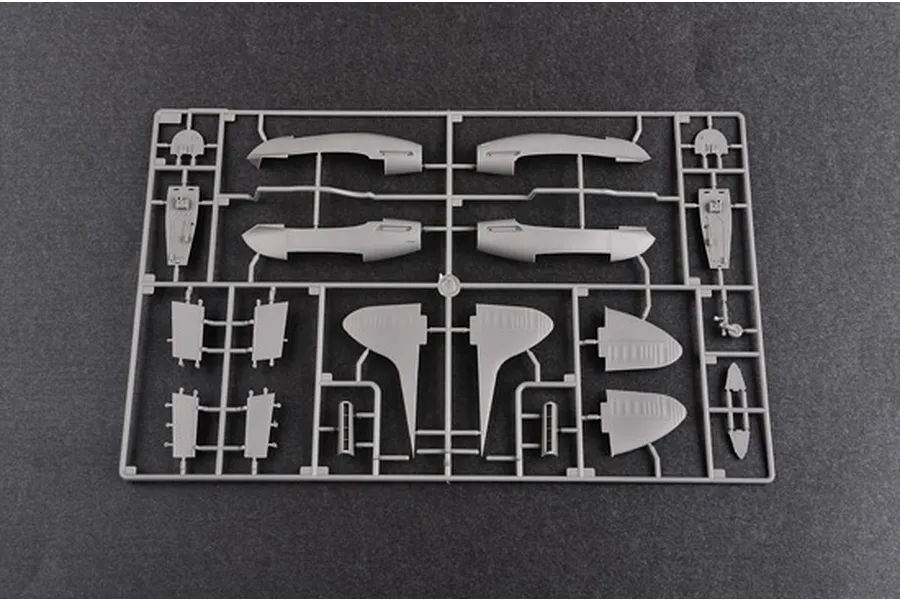 A grey plastic sprue containing various aircraft model parts for a Trumpeter 1/48 scale model kit.