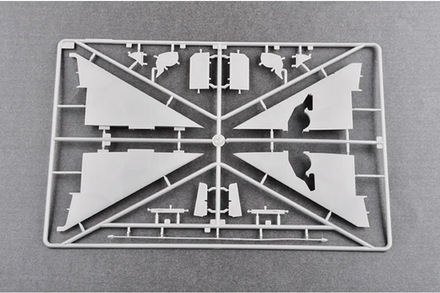 A grey plastic sprue containing aircraft wing and control surface parts for a 1/48 scale model kit.